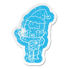 cartoon distressed sticker of a big brain alien crying wearing santa hat