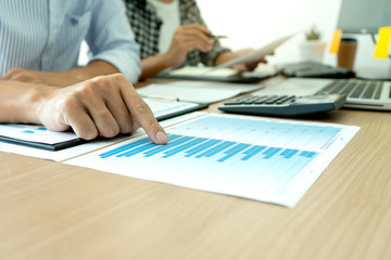 young business team in a small meeting