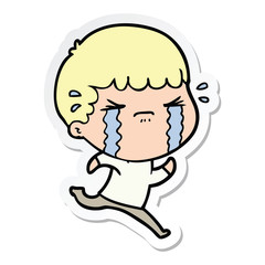 sticker of a cartoon man crying