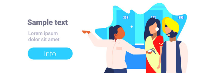 hotel manager showing room indian guests hospitality staff concept receptionist welcoming arriving man woman tourists couple in traditional clothes copy space portrait horizontal