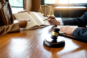 Obraz na płótnie Canvas Judge gavel with Justice lawyers, Businessman in suit