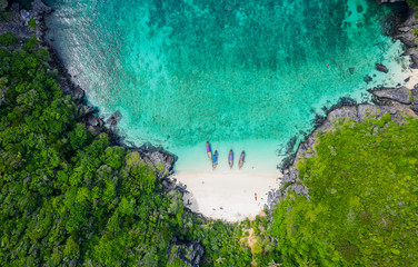 aerial view phi phi island high season summer holiday  tourists thai and foreign rent a long - tail...