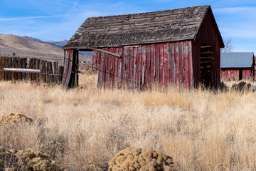 Abandoned red barns