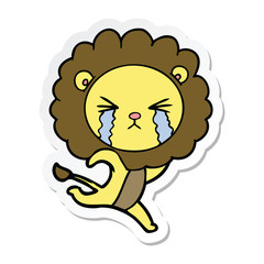 sticker of a cartoon crying lion running away