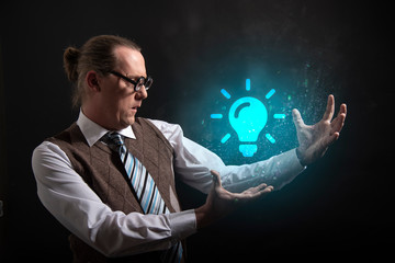 Funny nerd or geek showing light bulb icon