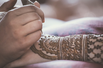Indian bride's pre wedding henna mehendi close up