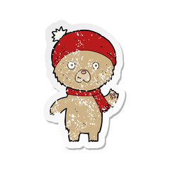 retro distressed sticker of a cartoon waving teddy bear
