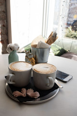 Aromatic coffee waiting for a visitor in a cafe