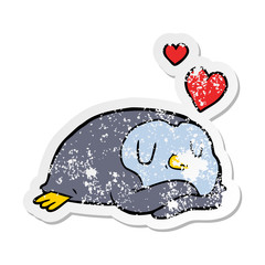 distressed sticker of a cartoon penguin in love