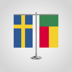 Table stand with flags of Sweden and Benin.Two flag. Flag pole. Symbolizing the cooperation between the two countries. Table flags