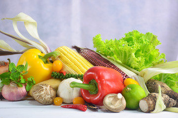 Organic vegetables on white wooden background, Healthy food.