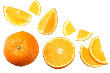 orange with slices isolated on white background. healthy food. top view