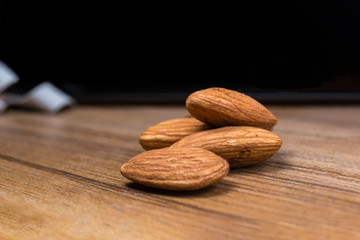 Almonds, almonds closeup on a white background, dry fruit.