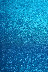 Glitter  wallpaper.  Glitter blue iridescent macro background with stars. Shiny backdrop.Snowy blue glitter shiny  abstract Background.