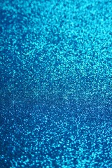 Glitter  wallpaper.  Glitter blue iridescent  background with stars. Shiny backdrop.Snowy blue glitter shiny  abstract Background.
