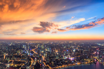 Fototapeta na wymiar Shanghai city skyline and beautiful colorful clouds at night