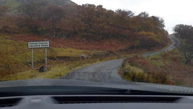 Sign and beginning of the historic road which has beed build by Calum MacDonald of Raasay on the the Isle of Raasay - Scotland