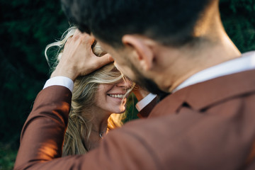 Romantic date bride and groom in the mountains.