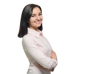 Confident young business woman with crossed arms in pink shirt on white isolated background, copy...