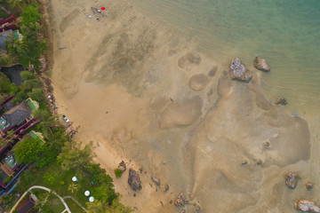 Tup Kaek beach close to Kwang beach and non Nak mountain during low tide .can see long and large beach can walk around many big rocks on the beach .beautiful sunset behind archipelago in Andaman sea