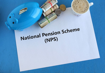 Investment of Indian rupees in National Pension Scheme (NPS) concept, for regular income after retirement and for tax benefits, highlighted with piggy bank, cash and coffee.