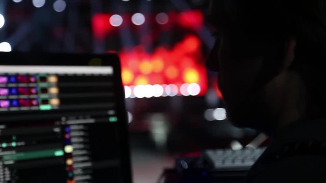 remote recordists closeup. Hand adjusts sound effects. Electric machine on table for working of sound designer or club dj at party in nightclub. Occupation for modern lifestyle, objects for listen at 