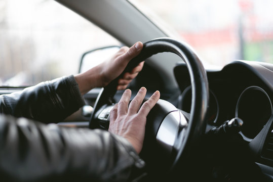 Angry Driver Is Honking And Is Yelling By Sitting Of A Steering Wheel. Road Aggression Concept. Traffic Jam.