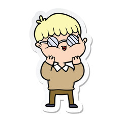 sticker of a cartoon boy wearing spectacles