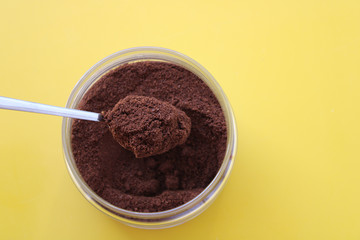 Grains of coffee in a jar, top view