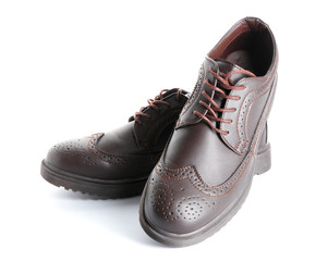 Pair of stylish male shoes on white background