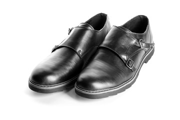 Pair of stylish male shoes on white background