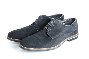 Pair of stylish male shoes on white background