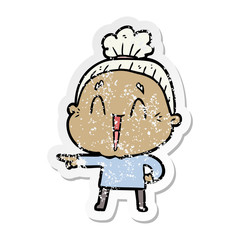 distressed sticker of a cartoon happy old lady