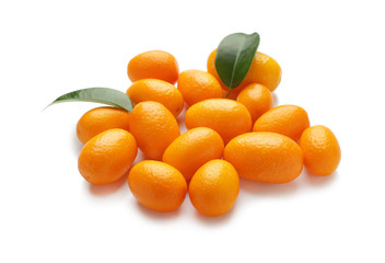Delicious kumquat fruit on white background