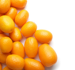 Delicious kumquat fruit on white background