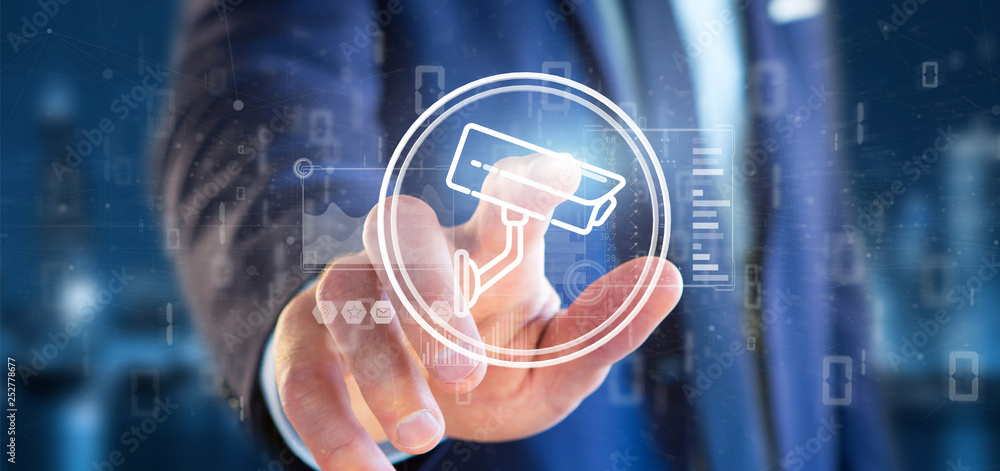 Poster businessman holding security camera system icon and statistics data - 3d rendering