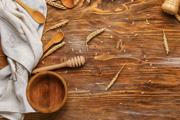 Set of kitchenware on wooden background