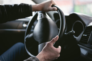 A driver is drifting on his car in sharp turn. Driver is lost control on the road. Automobile...