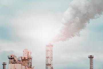 A large plan of the plant pipe, which produces harmful smoke in the environment against the...