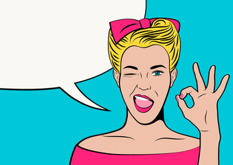 Pop art retro woman show gesture Ok and wink. Blank speech bubble. Vector illustration in comics style