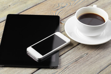 Fototapeta na wymiar digital tablet and smartphone on the table