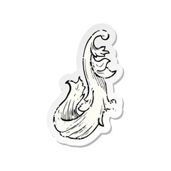 retro distressed sticker of a traditional hand drawn floral swirl
