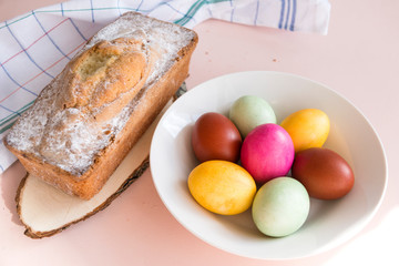 colorful Easter eggs in a plate, cake,