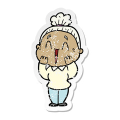 distressed sticker of a cartoon happy old lady