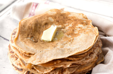 stack of pancakes with butter