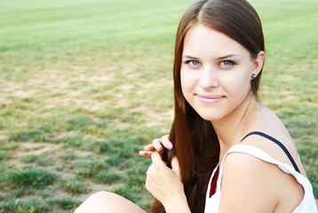 portrait of young woman in park