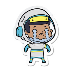 sticker of a cartoon crying astronaut