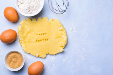 Easter Baking Background, Dough with Happy Easter Lettering