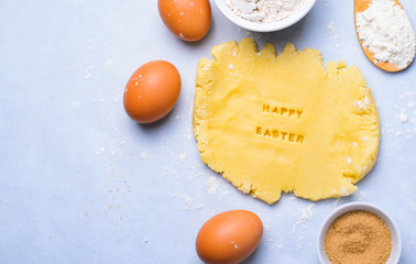 Easter Baking Background, Dough with Happy Easter Lettering