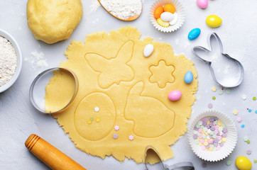 Making of Easter Cookies, Baking Background, Dough, Cookie Cutters, Sugar Sprinkles